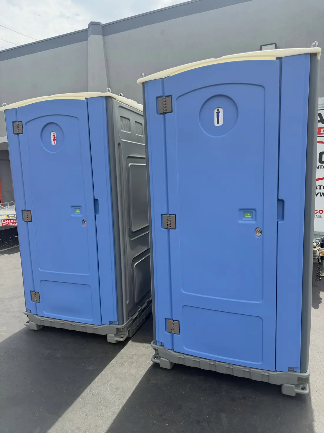 A pair of standard portable toilets from Clean Sanitation Pros, available for delivery to Mayhill, NM